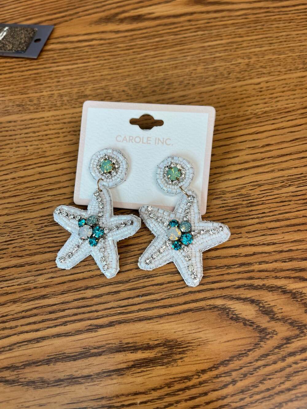 Carole Inc. white beaded starfish statement drop earrings nwt